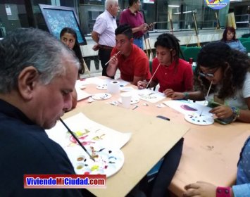 Joel Ramos en el Dia Munidal Pintor Boca y Pie